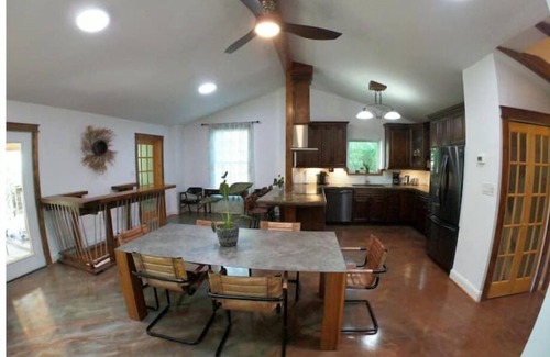 Camp Taylor House | Designer Architectural home near airport