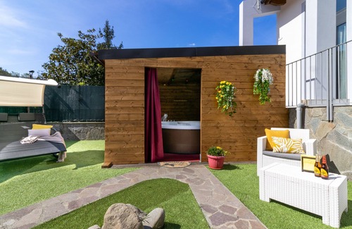 La Spezia Villa | Detached villa with outdoor hot tub, swimming pool and lawn