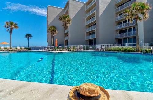 New Smyrna Beach Condo | Direct Ocean Front 2 Pools/Ground Floor- Drive on Beach! Rocket Launches weekly!