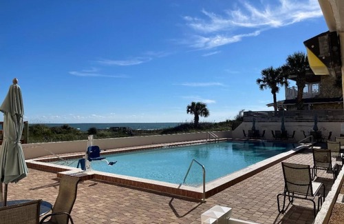 Crescent Beach Condo | Direct Ocean Front Condo With Heated Pool Located Directly on the Ocean