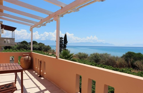 Pylos-Nestoras Apartment | Directly on the fine Memi sandy beach located apartment with sea view.