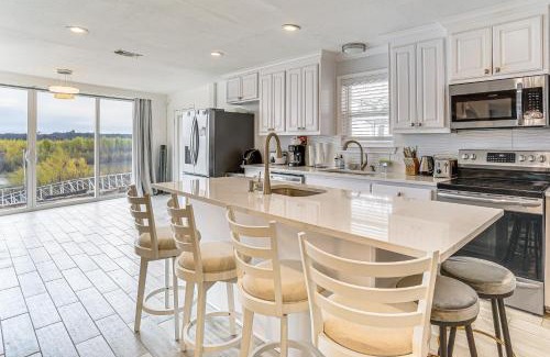 Runaway Bay House | Dock and Fire Pit Riverfront Runaway Bay Retreat