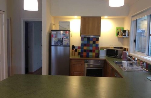 Sandy Point House | Dog friendly close to beach/shops, trampoline, hot outside shower, NBN Wifi