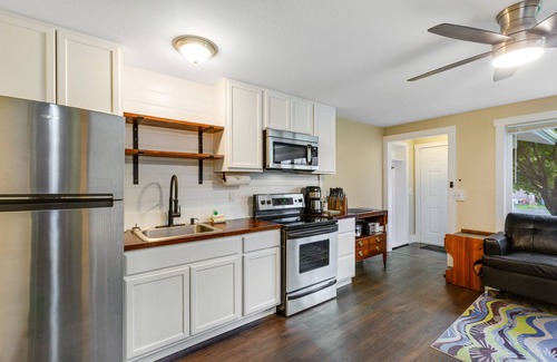 Clinton House | Dog-friendly home with a yard, washer/dryer, partial AC - near attractions