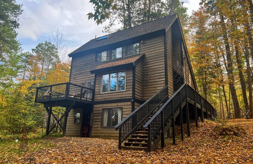 Lac du Flambeau House | Dog-friendly lakefront home with kayaks, bikes, dock, & W/D