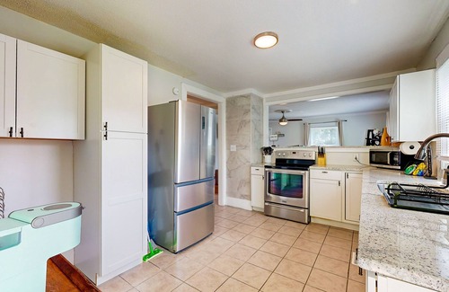 Burlington House | Dog-friendly spacious home near lake & town with fireplace & private backyard