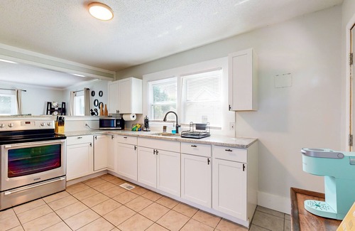 Burlington House | Dog-friendly spacious home near lake & town with fireplace & private backyard