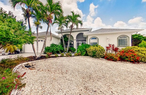 Matlacha Isles House | Dog-friendly waterfront home with heated pool, lanai, central AC, & W/D