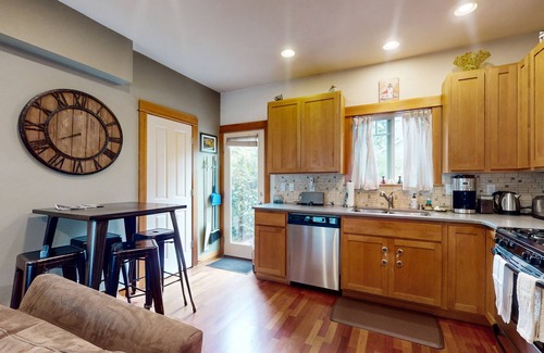 North Delridge House | Dog-friendly Westside Escape with fireplace, W/D, fenced yard - 3 miles to beach