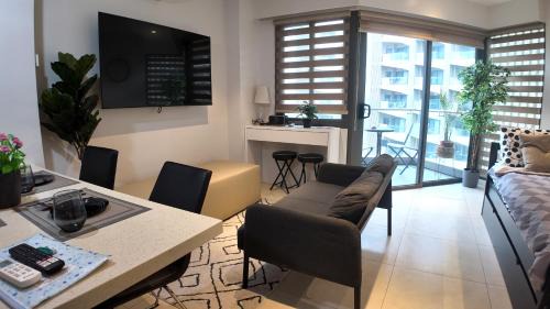 Maribago Apartment | Dominiks quite and Elegant Studio Ocean View Pool at Tambuli Resort High Floor