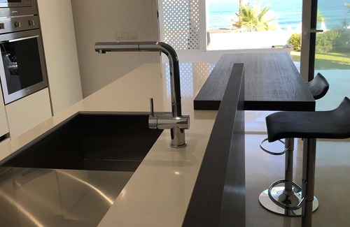 New Golden Mile Apartment | Dominion Beach Ground floor app. with garden 6 people directly by the sea and swimming pool