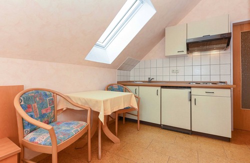 Esens Cottage | Doppelzimmer Seepferd in der Hotel-pension Altes Siel - Doppelzimmer Seepferd mit Balkon