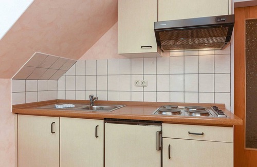 Esens Cottage | Doppelzimmer Seepferd in der Hotel-pension Altes Siel - Doppelzimmer Seepferd mit Balkon