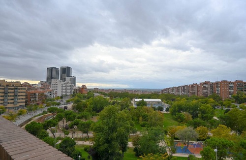Almenara Apartment | Duplex Penthouse with Spectacular Park Views in Tetuán