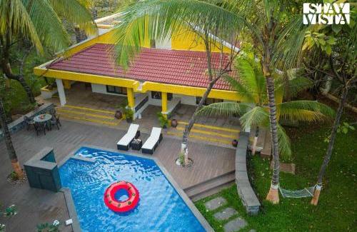 Nagaon Villa | Eden's Estate by StayVista - Featuring cozy rooms with a private pool, and modern interiors for a delightful stay