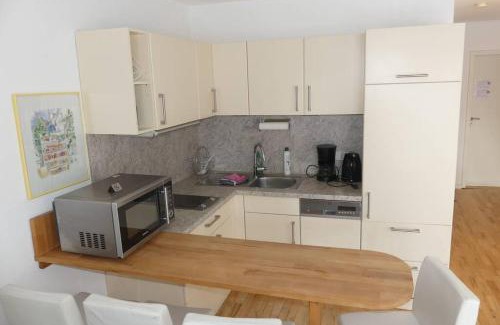 Kleinmachnow Apartment | Einliegerwohnung mit Wintergarten (EG)