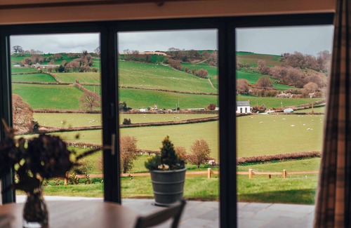 Montgomery House | Eithriadol Maldwyn is a collection of luxury countryside homes with a sauna and hot tubs. Pet friendly with electric car chargers, sleeping 16.