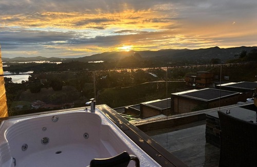 El Penol Condo | El Penol - Guatape Romantic CondonPrivate Jacuzzi with a view of La Piedra