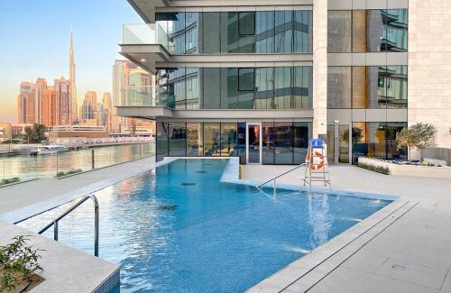 Al Safa Apartment | Elegant 1BR Apt with Balcony Views of Burj Khalifa & Dubai Canal