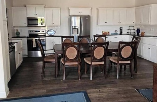 Wright Area Action Group House | Elegant 2-Bedroom Retreat with Modern Amenities & Lush Outdoor Spaces