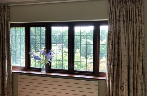 Stoke Poges Villa | Elegant family home backing into a Golf Course .