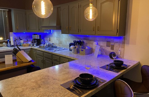 Fort Morgan House | Elegant Three Bedroom Home with Patio and Fireplace