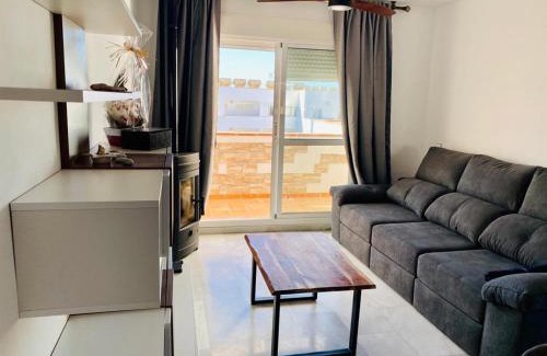 Retamar Apartment | Encantador ático con chimenea y piscina en Almería
