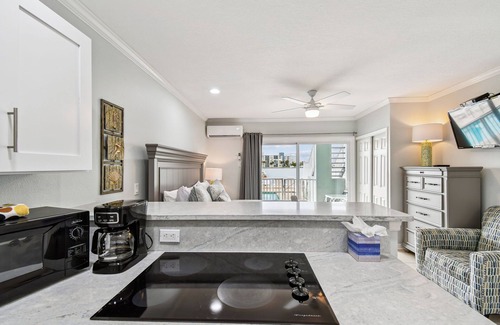 Bay Esplanade Apartment | Enchanted Inn Suite #2 w/View of the Intra-costal water-way Pool, Fishing Dock,