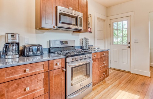 Alberta Arts District House | Enchanting home with full kitchen, AC, & washer/dryer