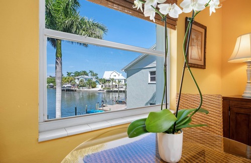 Anna Maria Condo | Endless Summer- On Pine Ave, steps to beach & pier w/water view & dock