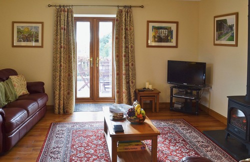 Glandyfi Cottage | Enjoy a holiday here at any time of year in this cosy converted cottage.