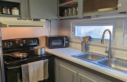 Adamstown House | Enjoy a Peaceful environment with neighboring mini pones a fire pit to sit under the stares. roll into the oversized parking lot and enjoy this lovely modern farm home.