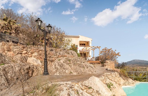 Priego de Cordoba House | Enjoy a unique view of the countryside in this comfortable vacation home with pool.