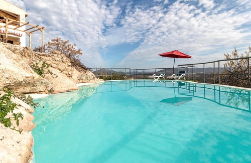 Priego de Cordoba House | Enjoy a unique view of the countryside in this comfortable vacation home with pool.