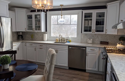 Lenox House | Enjoy comfortable elegance in this secluded grand home located in town