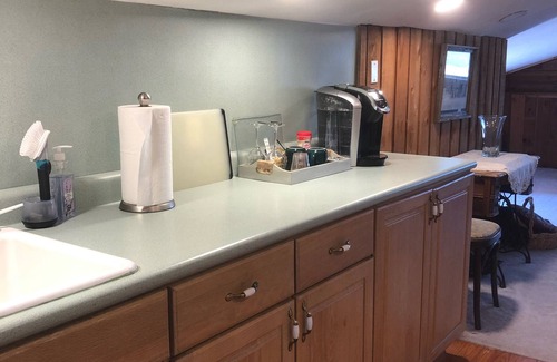 Edmond Cabin | Enjoy our loft with a private hot tub overlooking the vineyard and pond.