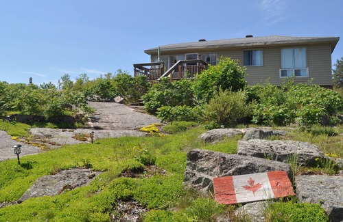 Britt Cottage | Entertainer's Dream Cottage! Waterfront, beach, steps to ice cream, marina, shop