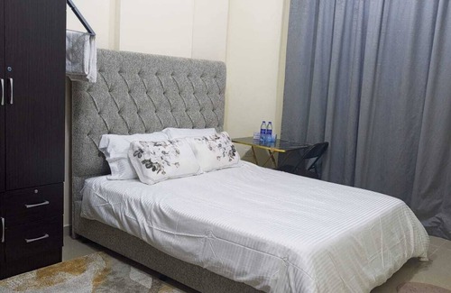 Mussafah Apartment | Escape to comfortn 2-bedroom apartment with WiFi, AC in fabulous Abu Dhabi