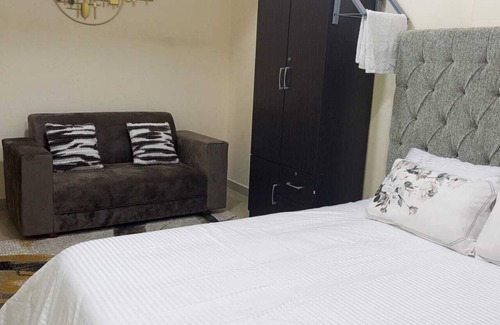 Mussafah Apartment | Escape to comfortn 2-bedroom apartment with WiFi, AC in fabulous Abu Dhabi