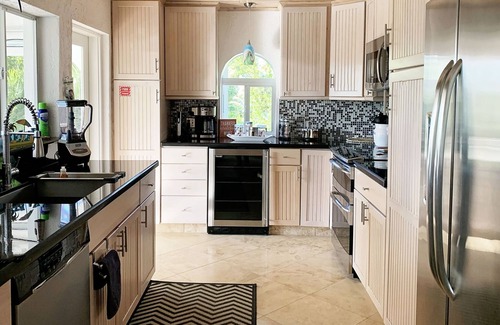 Marathon House | Escape to Paradise, enjoy the Outdoor Kitchen, Pool, Dock, Canal Views and more