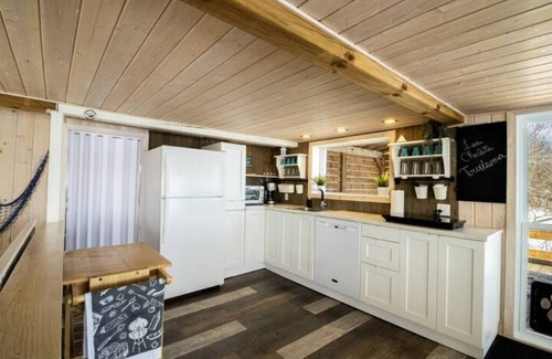 Grondines Cottage | Escape to Riverfront, Relax with Hot Tub, BBQ