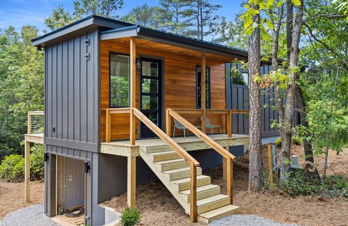 Young Harris Apartment | Escape to this modern 1BR/1BA tiny home in the North Georgia mountains. Enjoy a full kitchen, spa-style rain shower, and private deck surrounded by crisp air and changing leaves. Perfect for cozy autumn nights and mountain adventures.