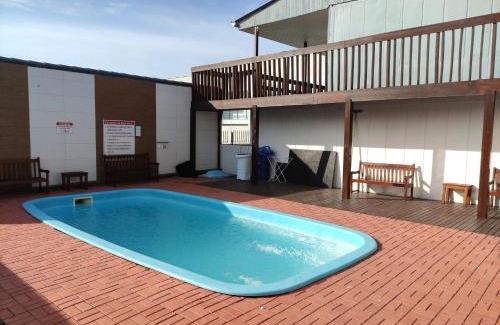 Porto Belo Apartment | Estúdio e Suítes com Piscina, churrasqueira, AR Split, WIFI - 6x sem juros no cartão