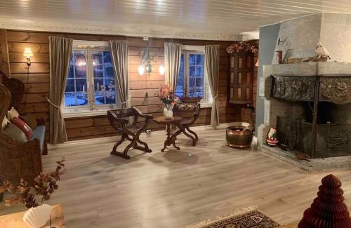 Hundorp House | Eventyrlig Tømmerhytte på Gårdstun