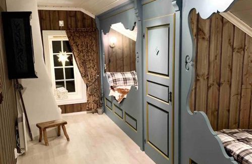 Hundorp House | Eventyrlig Tømmerhytte på Gårdstun