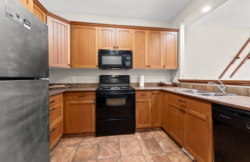 Sun Peaks House | Exceptional multi level 2 bedroom +den townhouse with easy access to nearby runs and lift