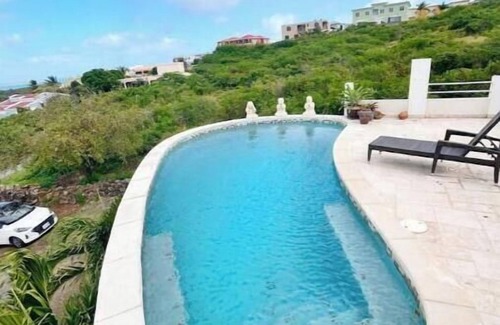 Oyster Pond Apartment | Exclusive apartment with scenic valley views