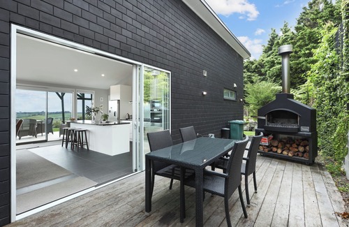 Mangawhai House | Exclusive home with uninterrupted views of the Hen & Chicks, set in Native Bush