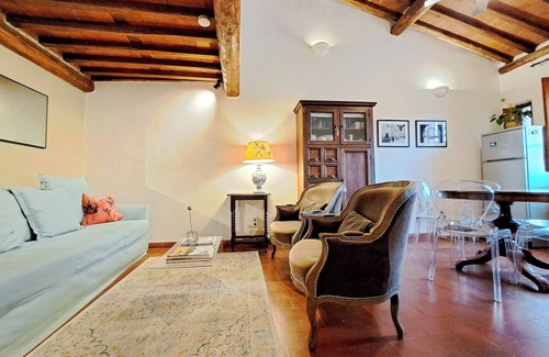Lucca Historical Center Apartment | Exclusive retreat in the historic center of Lucca, overlooking Piazza Anfiteatro