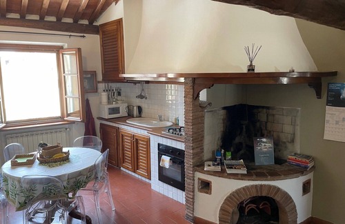 Lucca Historical Center Apartment | Exclusive retreat in the historic center of Lucca, overlooking Piazza Anfiteatro
